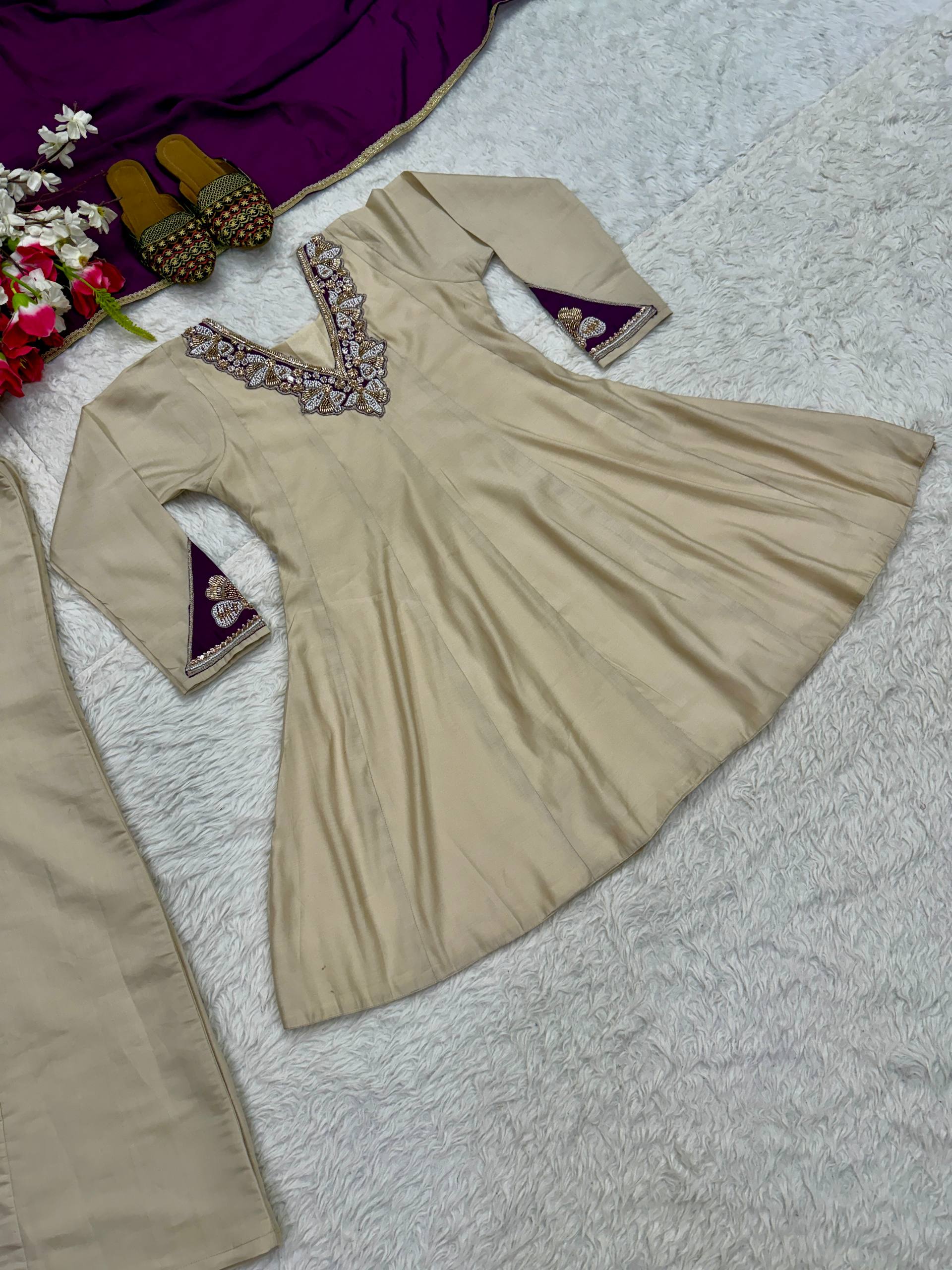 Regal Cream Silk Peplum Kurti and Flared Palazzo Suit Set Adorned with Ornate V-Neck Embroidery and a Rich Plum Purple Dupatta